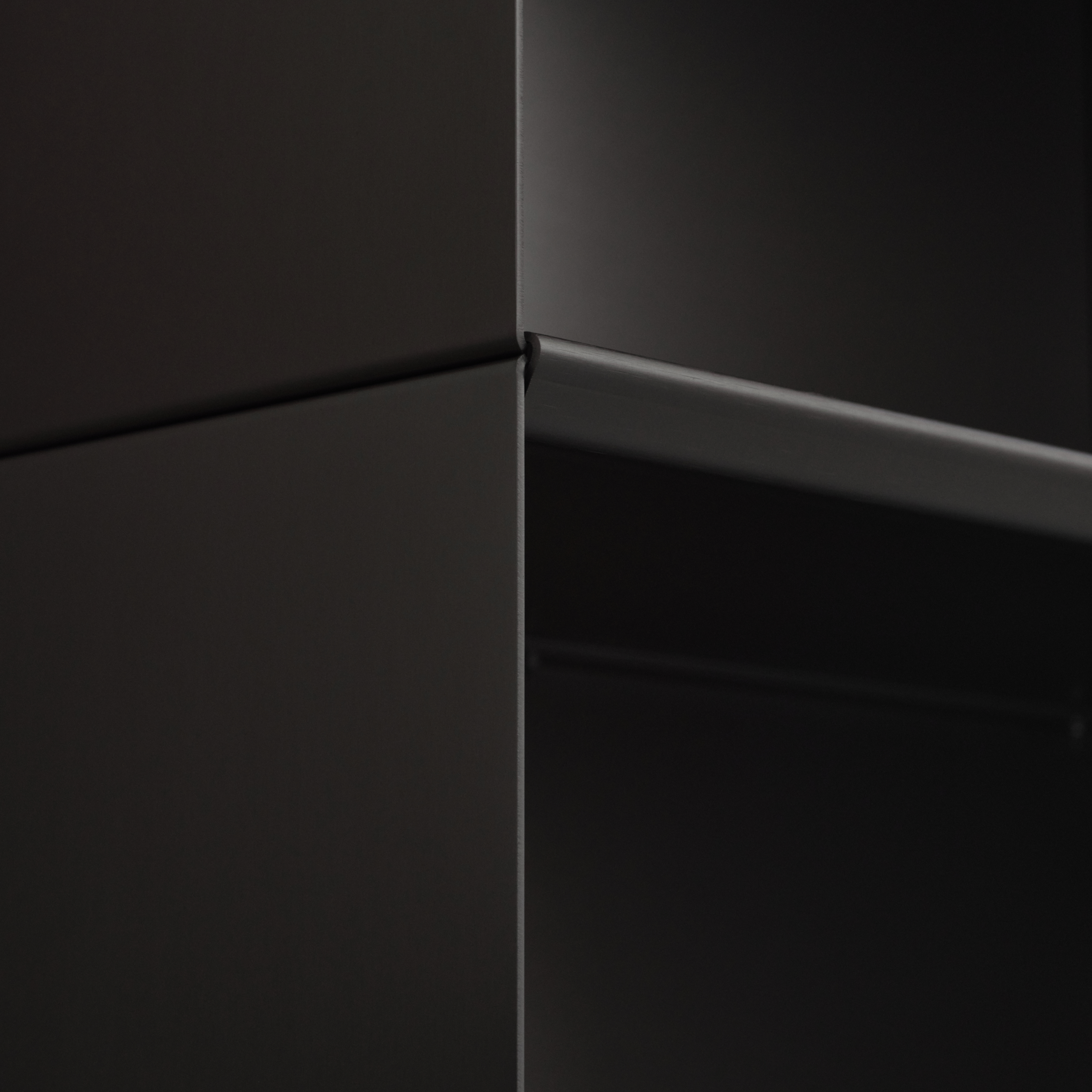 Close-up of M85 modular shelf showing side where two vertical modules meet.