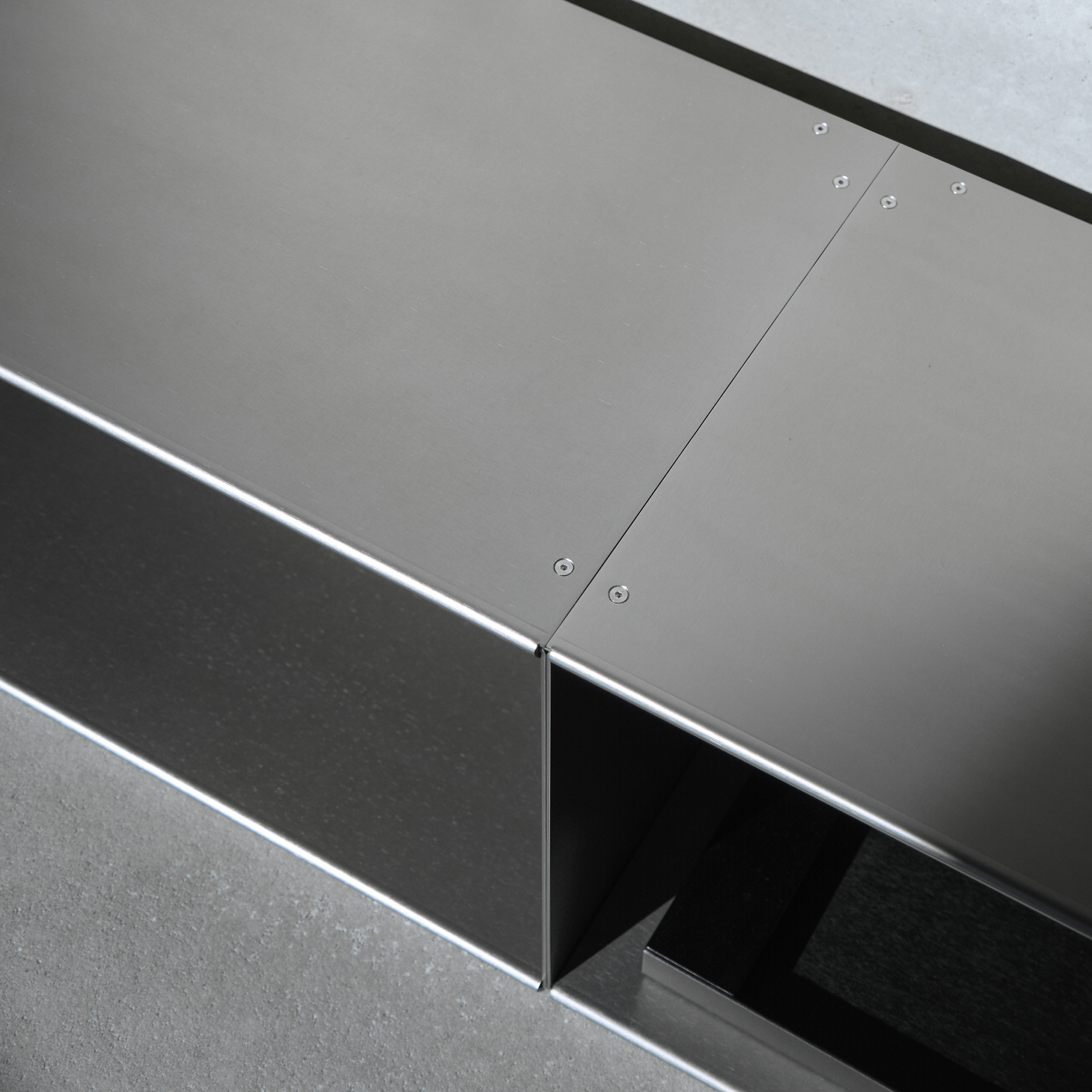 Close up of M85 aluminum modular low console made of two modules connected together